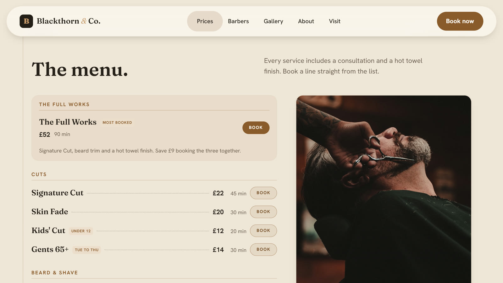The price menu, listing cuts, beard and shave services with prices from a 12 pound kids' cut to the 52 pound full works.